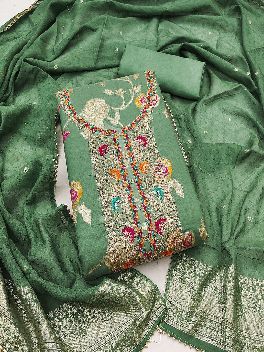 Green Elegant Modal Jacquard Dress Material Adorned with Intricate Zari Weaving - Image 1