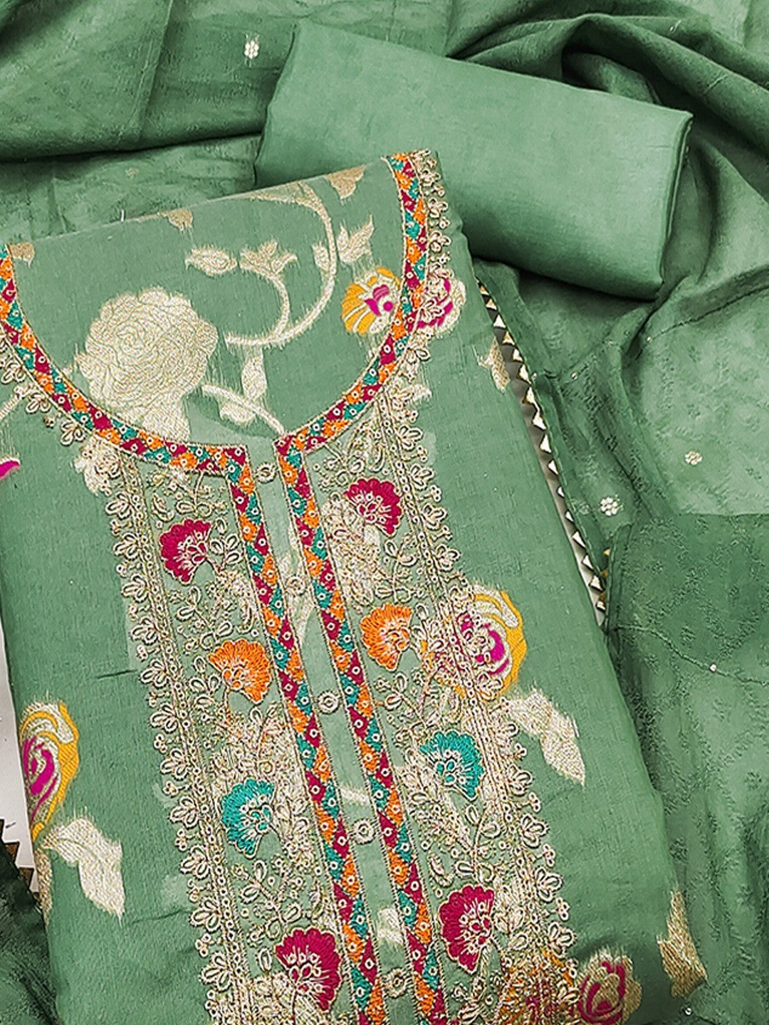 Green Elegant Modal Jacquard Dress Material Adorned with Intricate Zari Weaving - Image 5