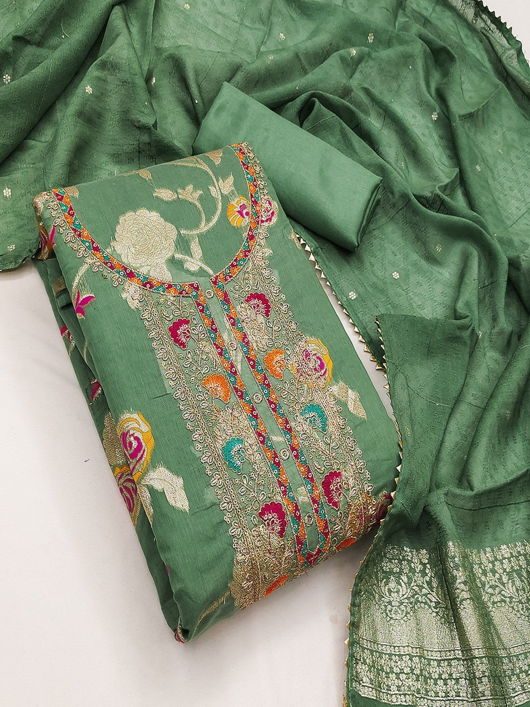 Green Elegant Modal Jacquard Dress Material Adorned with Intricate Zari Weaving - Image 4