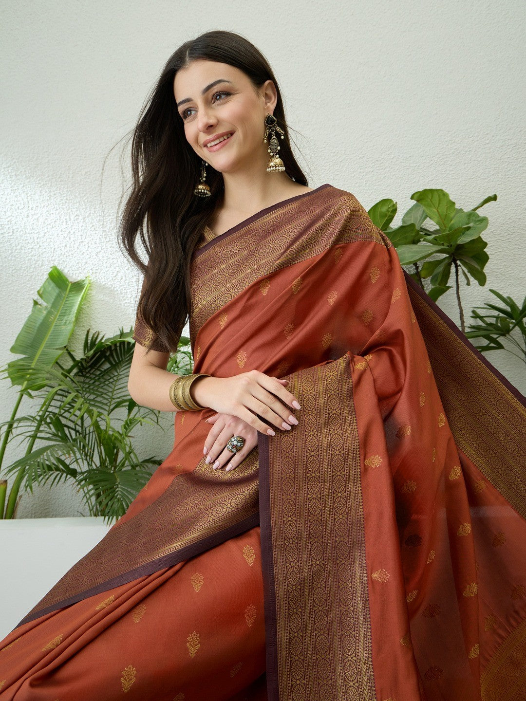 Sophisticated Rust Floral Woven Silk Blend Saree Highlighted By Rich Zari & Tassels - Image 5