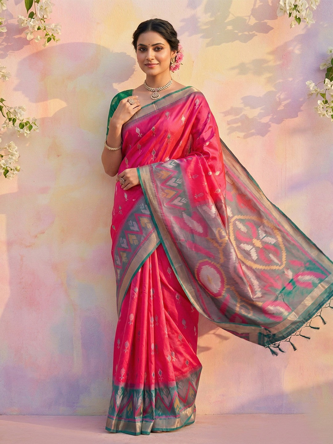 Elegant Pink Ikat Woven Silk Blend Saree Featuring A Traditional Motif Pallu With Tassel Accents - Image 1