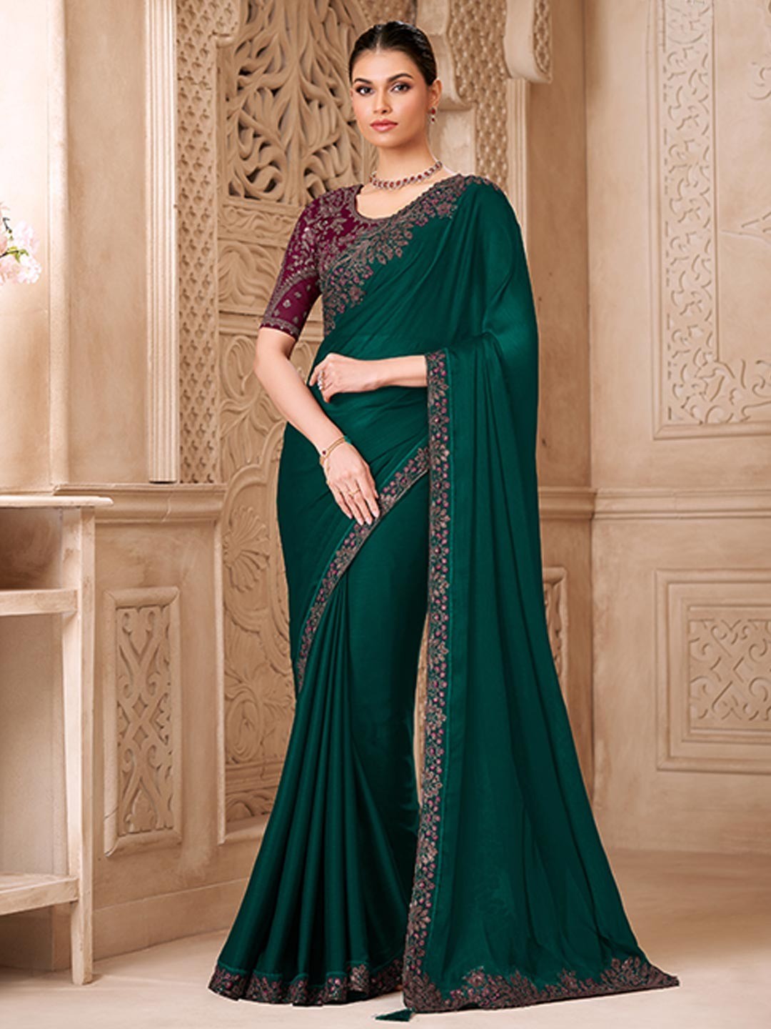 Dark Green Georgette Saree Featuring Detailed Embroidered Border - Image 1