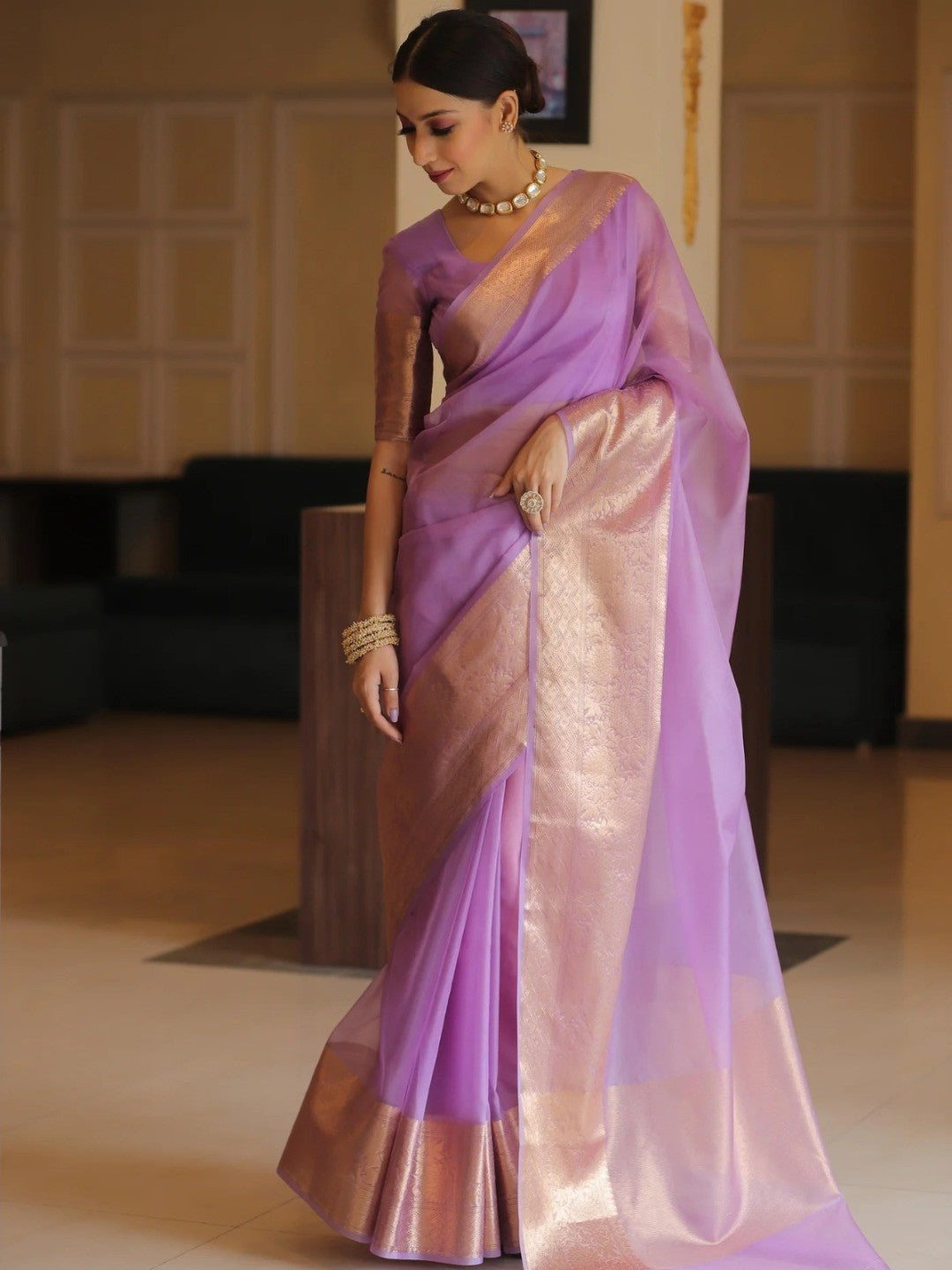 Classic Lavender Solid Organza Saree Featuring Floral Golden Zari Weaving Border - Image 1