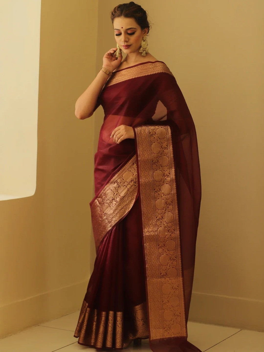 Classic Maroon Solid Organza Saree Featuring Floral Golden Zari Weaving Border - Image 3