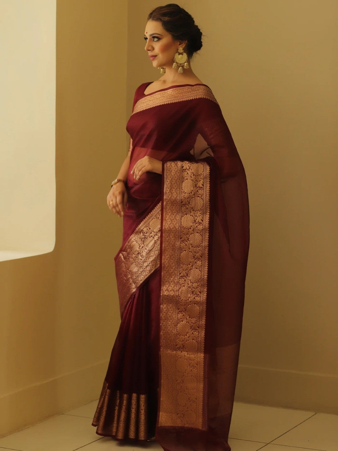 Classic Maroon Solid Organza Saree Featuring Floral Golden Zari Weaving Border - Image 5