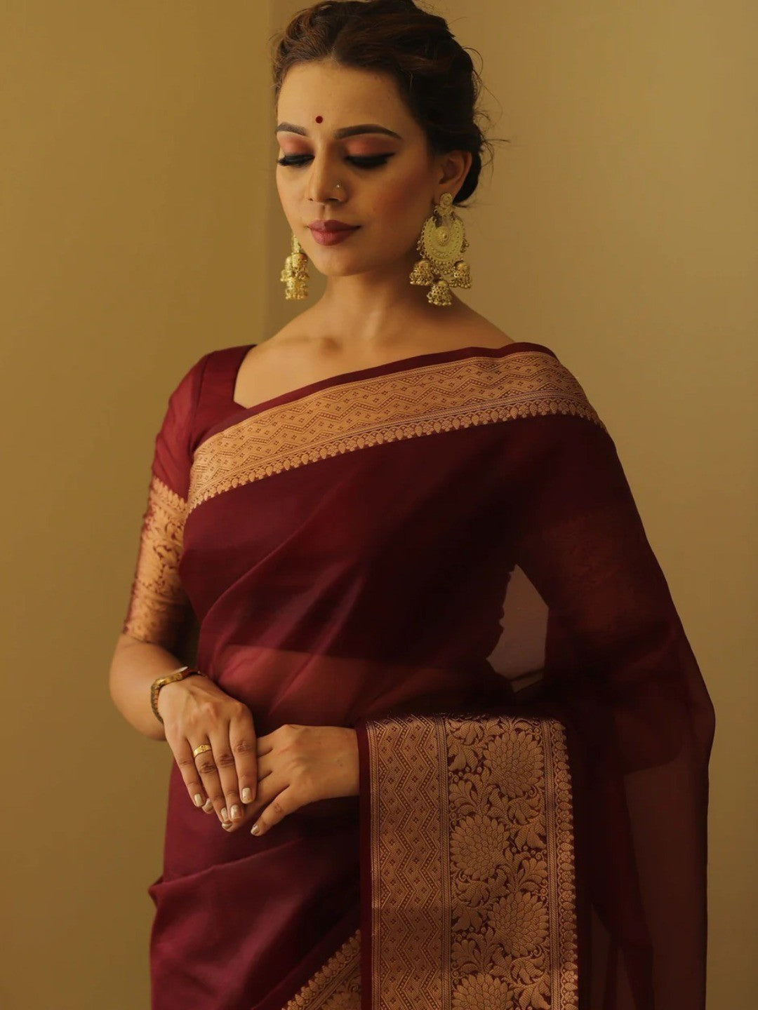 Classic Maroon Solid Organza Saree Featuring Floral Golden Zari Weaving Border - Image 2