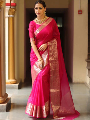 Classic Rani Pink Solid Organza Saree Featuring Floral Golden Zari Weaving Border - Image 1