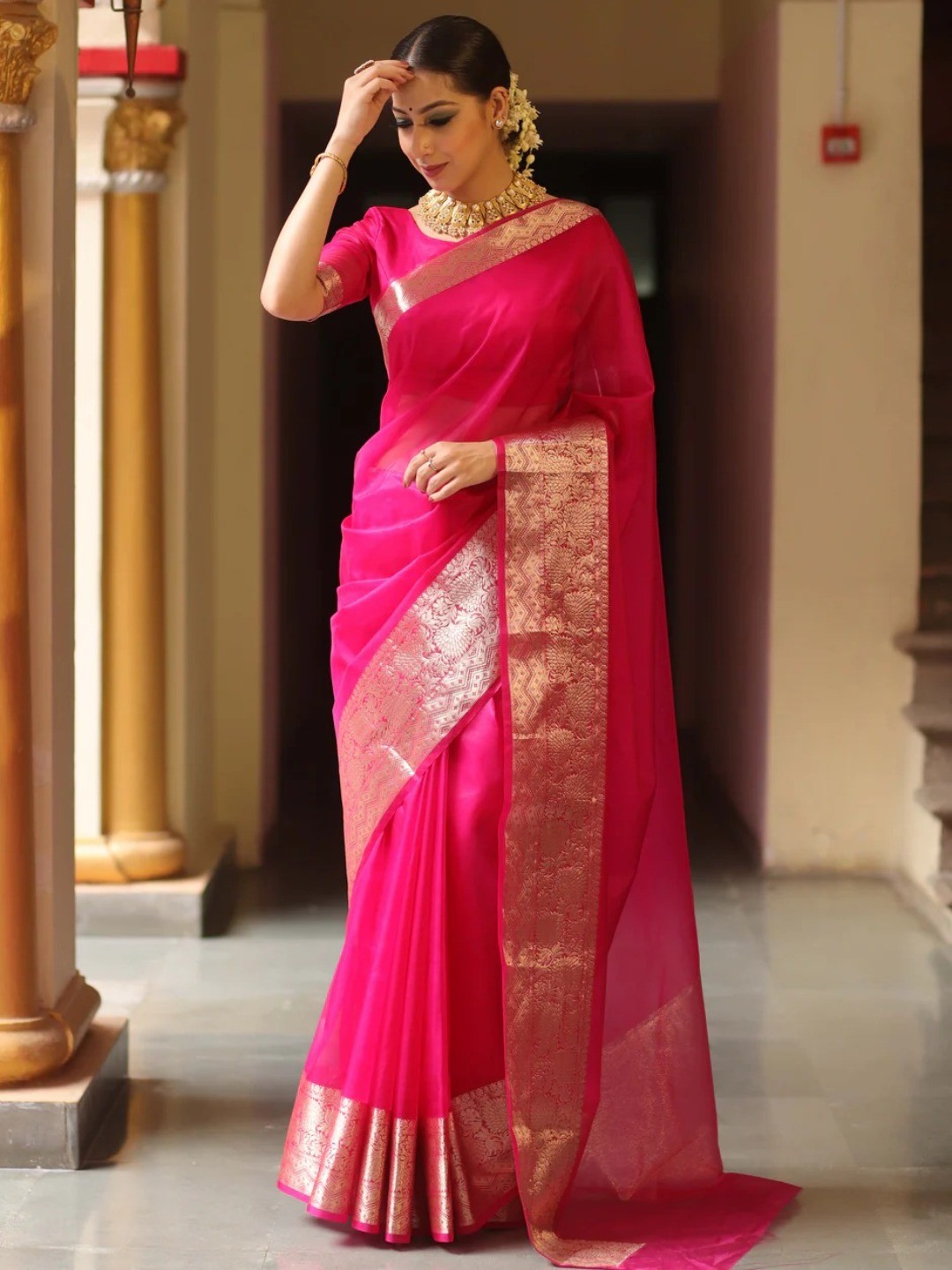 Classic Rani Pink Solid Organza Saree Featuring Floral Golden Zari Weaving Border - Image 3