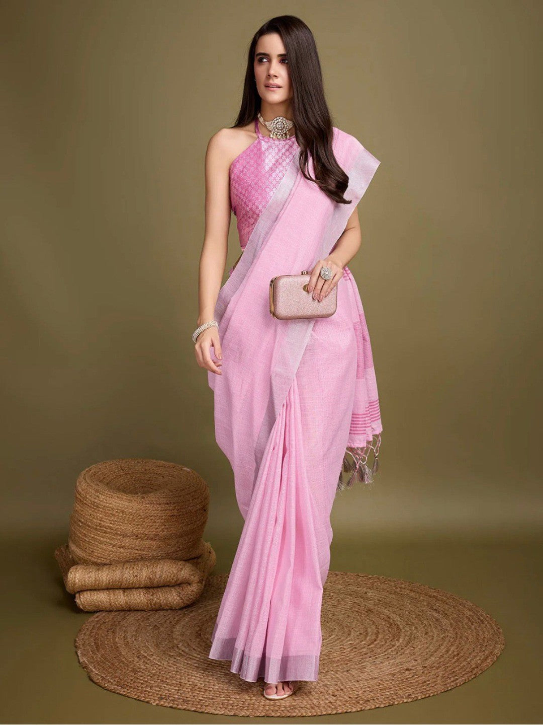 Sophisticated Pink Linen Saree Featuring Intricate Zari Weaving & Tassel Accents - Image 1