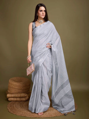 Sophisticated Grey Linen Saree Featuring Intricate Zari Weaving & Tassel Accents - Image 1