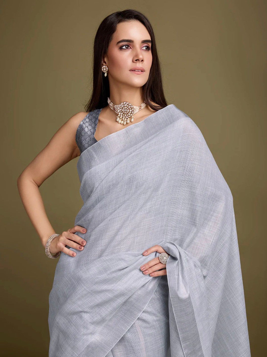 Sophisticated Grey Linen Saree Featuring Intricate Zari Weaving & Tassel Accents - Image 4