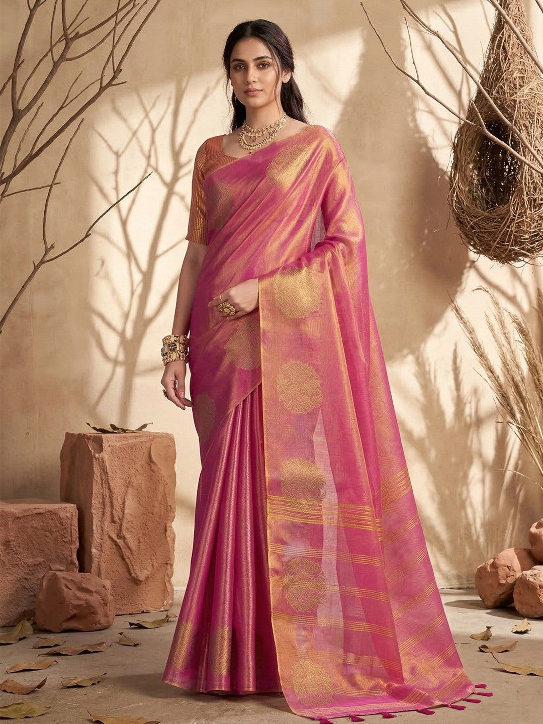 Classic Rani Pink Floral Zari Weaving Tissue Silk Saree With Tassel Pallu - Image 1