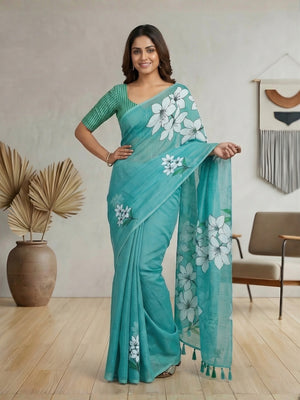 Refreshing Turquoise Floral Printed Linen Saree Styled With Elegant Tassel Pallu - Image 1