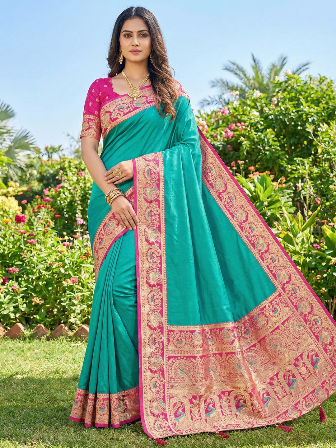 Turquoise Pure Silk Saree with Detailed Woven Border and Stitched Blouse for Elegant Styling - Image 1