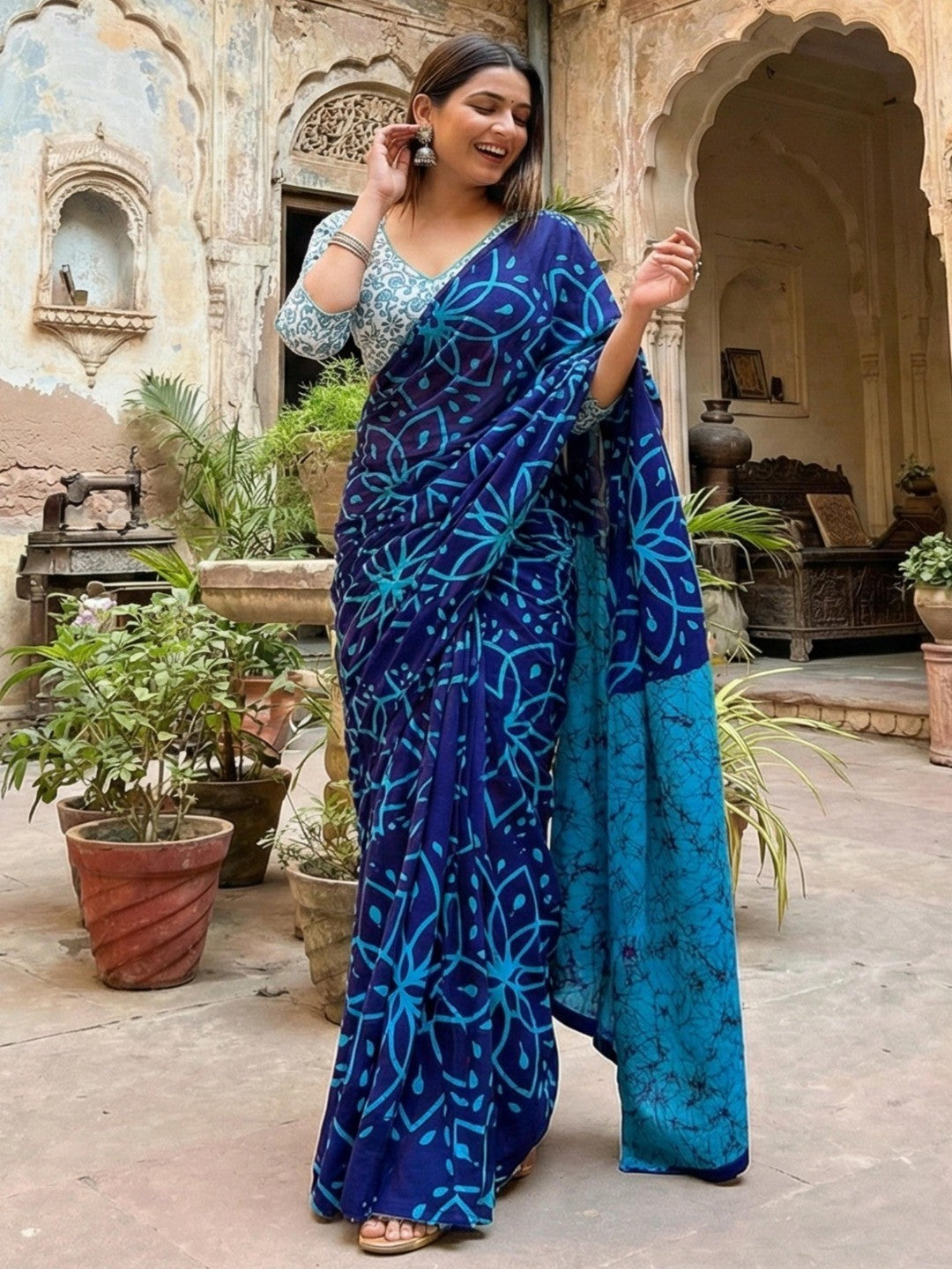 Sophisticated Blue Floral Printed Mulmul Cotton Saree With Unique Abstract Pattern Pallu - Image 1
