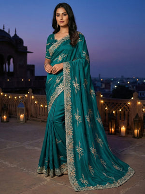Elegant Teal Satin Saree with Floral Embroidery and Detailed Border - Image 1