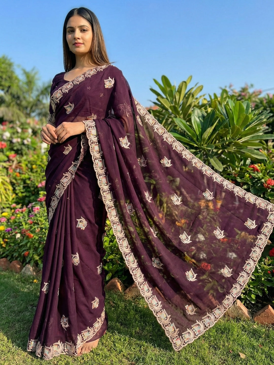 Graceful Purple Georgette Saree with Artistic Embroidered Pattern - Image 1