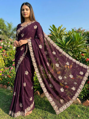 Graceful Purple Georgette Saree with Artistic Embroidered Pattern - Image 1