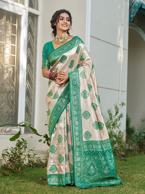 Graceful Cream & Turquoise Floral Weaving Silk Blend Saree Enhanced With Designer Tassel Pallu - Image 1