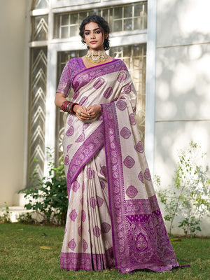 Graceful Cream & Purple Floral Weaving Silk Blend Saree Enhanced With Designer Tassel Pallu - Image 1