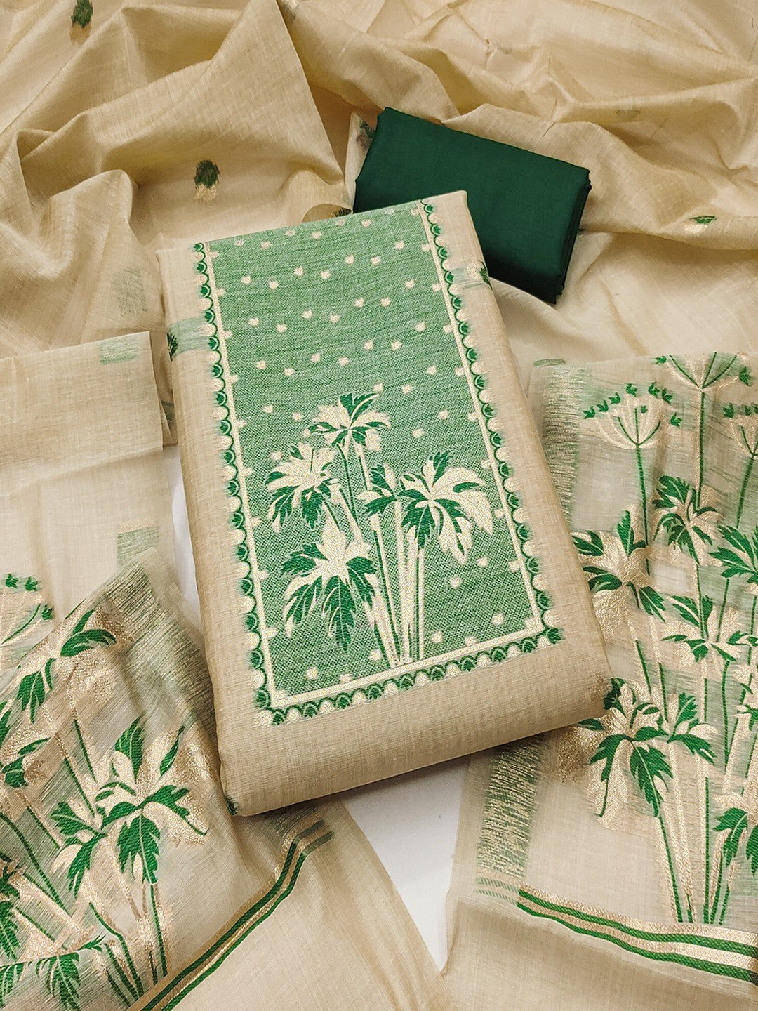Elegant Beige & Green Floral Zari Weaving Chanderi Silk Dress Material With Intricate Work - Image 1