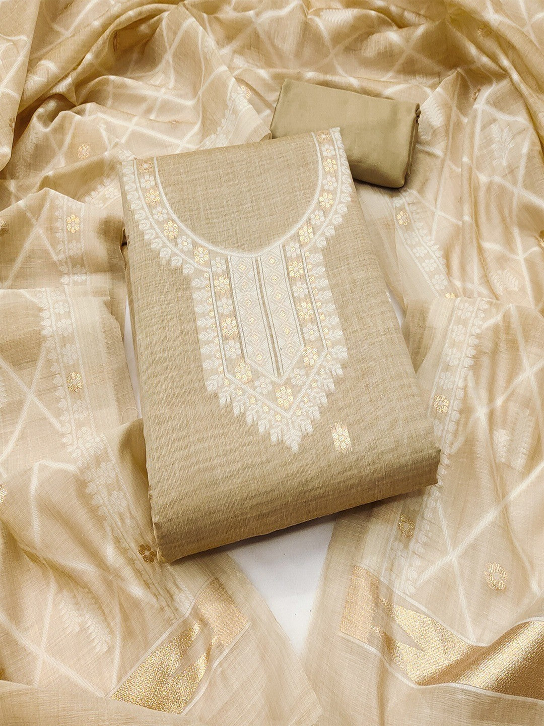Premium Cream Floral Weaving Chanderi Silk Dress Material With Intricate Zari Work - Image 1