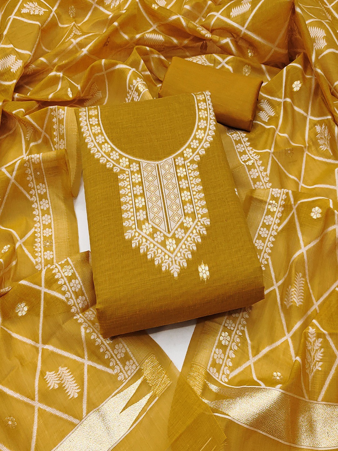 Premium Mustard Floral Weaving Chanderi Silk Dress Material With Intricate Zari Work - Image 1