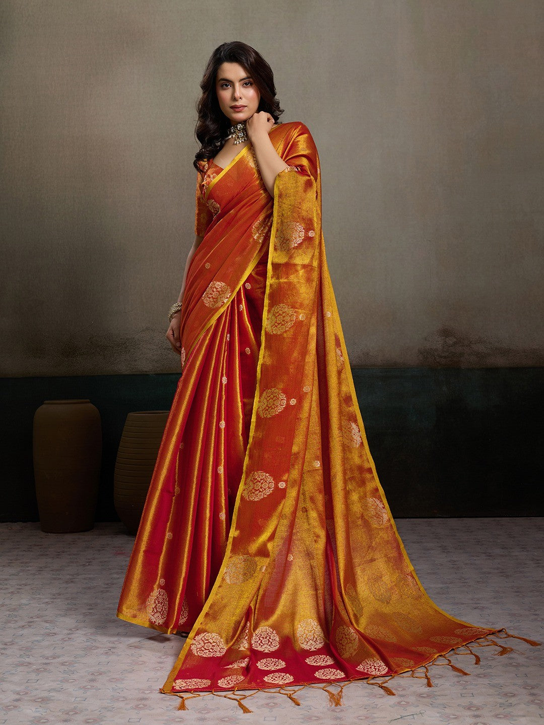 Stylish Orange Tissue Saree with Fine Woven Floral Patterns and Glossy Finish - Image 1