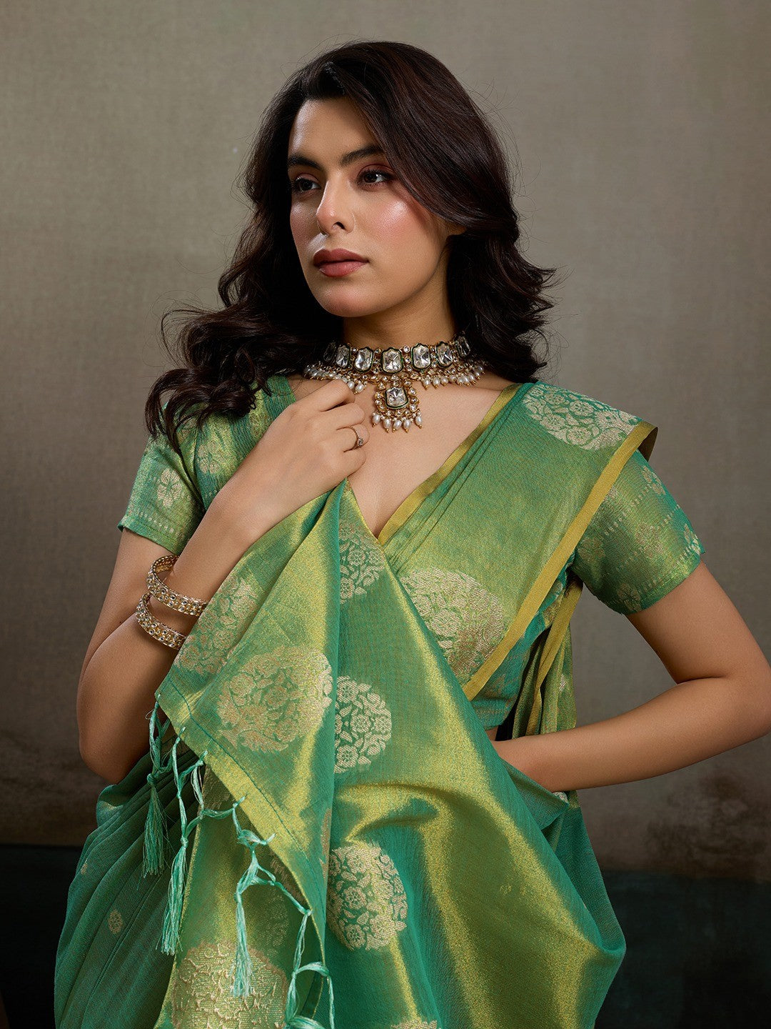 Stylish Green Tissue Saree with Fine Woven Floral Patterns and Glossy Finish - Image 6