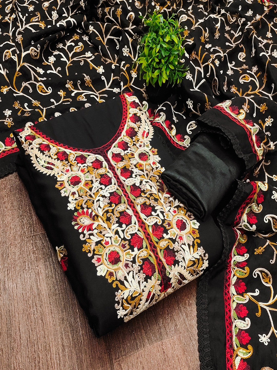 Ethnic Black Roman Art Silk Dress Material Highlighted With Floral & Paisley Thread Embroidery - Image 1