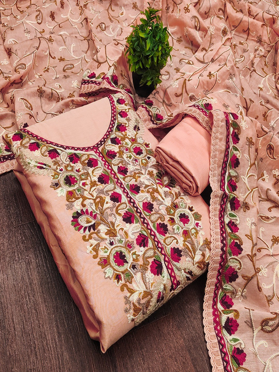 Ethnic Peach Roman Art Silk Dress Material Highlighted With Floral & Paisley Thread Embroidery - Image 3