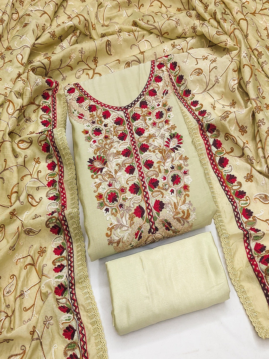 Ethnic Pista Green Roman Art Silk Dress Material Highlighted With Floral & Paisley Thread Embroidery - Image 1