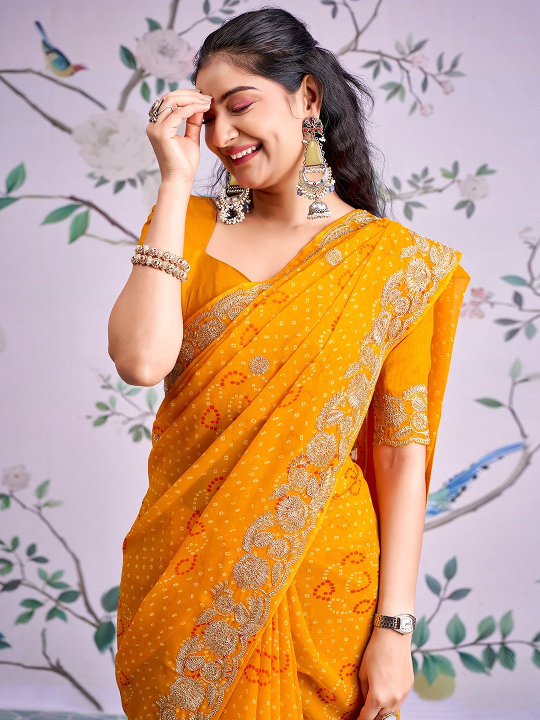 Graceful Mustard Bandhani Print Georgette Saree Highlighted With Floral Embroidery Work Border - Image 2