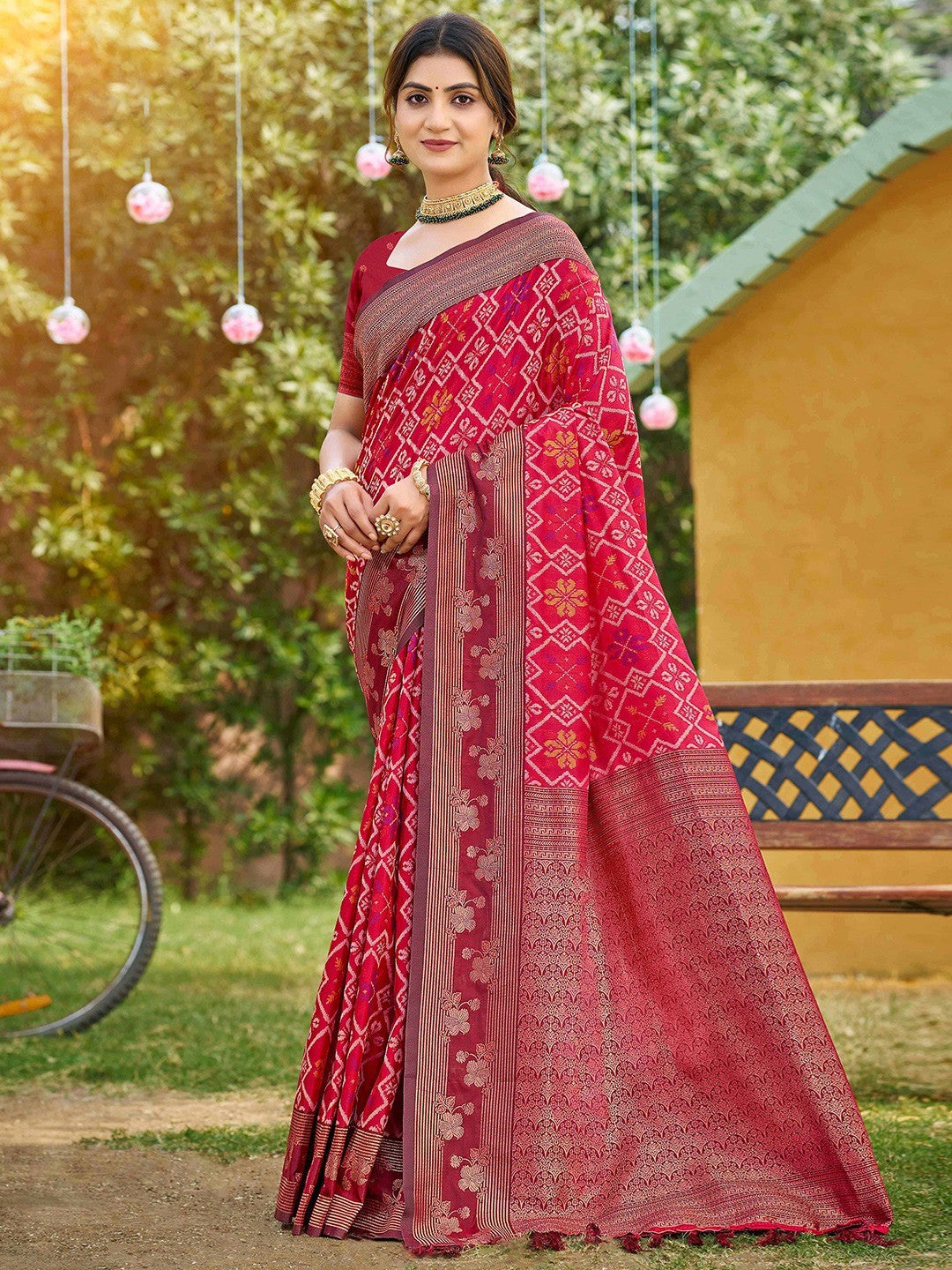 Ethnic Pink Floral & Geometric Zari Weaving Silk Blend Saree With Tassels Pallu - Image 1