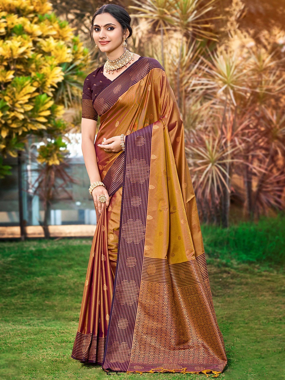Graceful Golden Brown Zari Woven Silk Blend Saree With Floral Motif Detailing & Elegant Tassels Pallu - Image 1