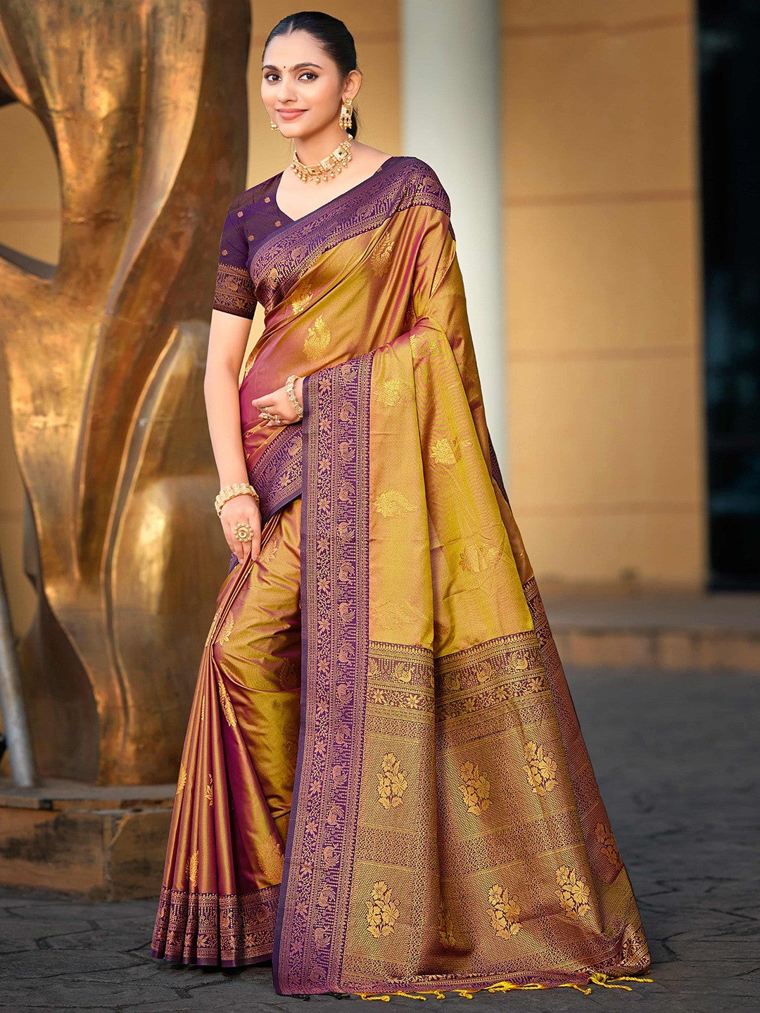 Classic Golden Brown Peacock & Floral Motif Zari Woven Silk Blend Saree With Decorative Tassel Pallu - Image 1