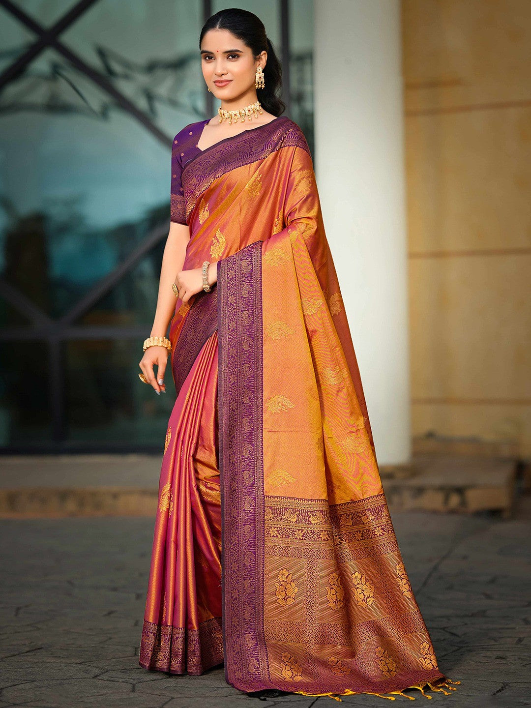 Classic Burnt Orange Peacock & Floral Motif Zari Woven Silk Blend Saree With Decorative Tassel Pallu - Image 1