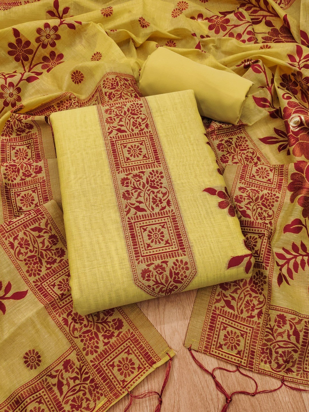 Yellow Cotton Blend Dress Material with Floral Patterns and Jamdani Woven Detailing - Image 1