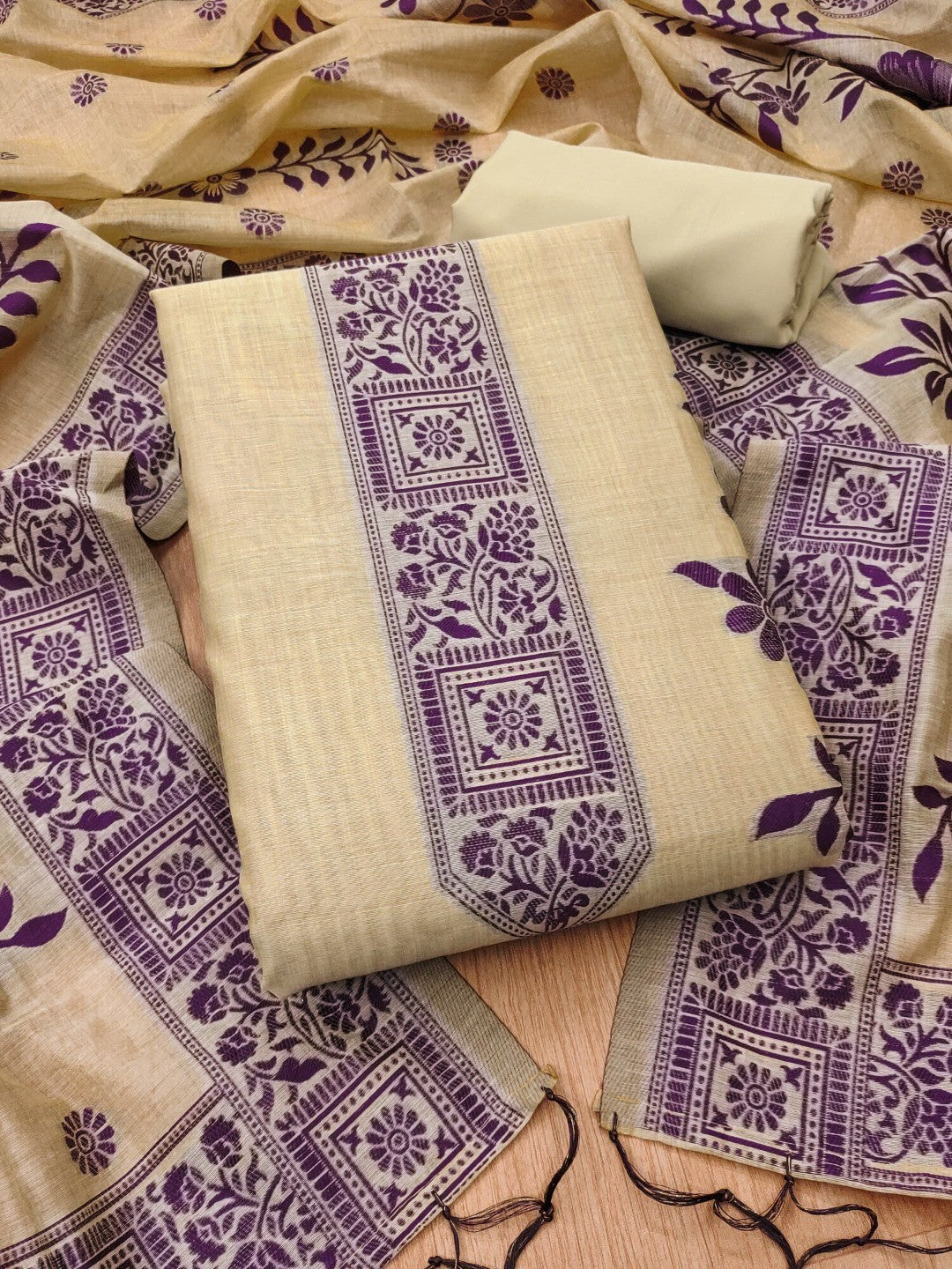 Cream Cotton Blend Dress Material with Floral Patterns and Jamdani Woven Detailing - Image 1