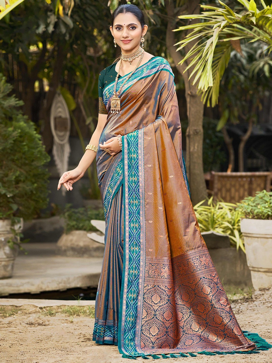 Graceful Brown Paisley & Floral Design Zari Work Silk Blend Saree With Attractive Tassels Pallu - Image 1