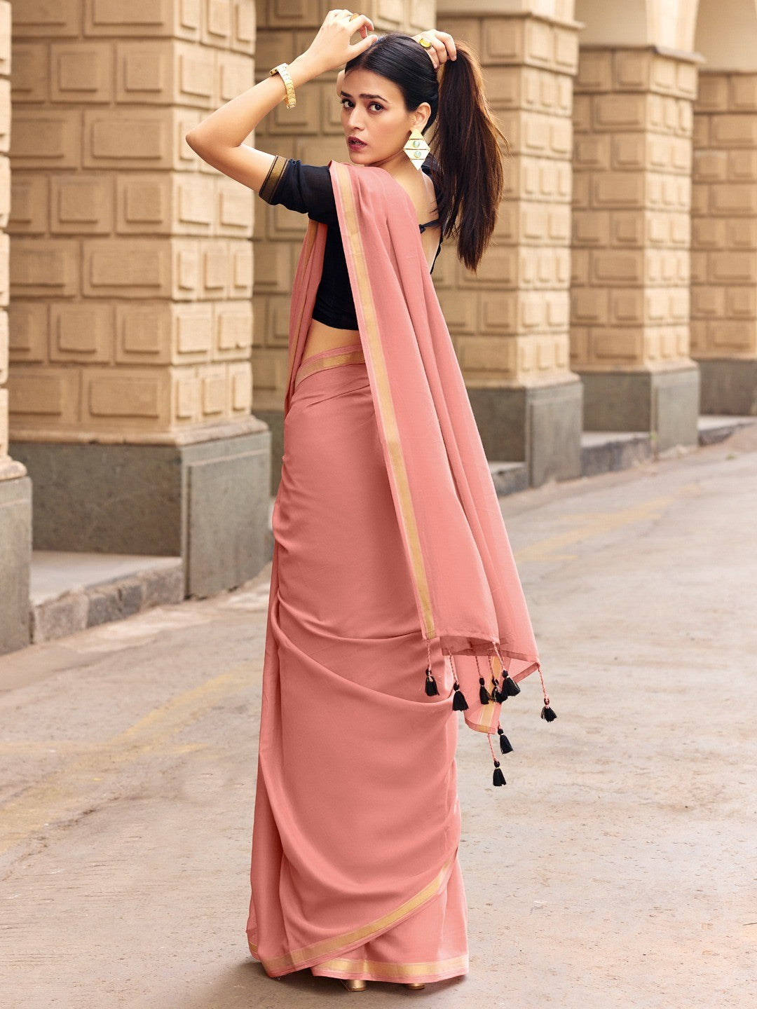 Charming Peach Solid Mulmul Cotton Saree Highlighted By Zari Weaving Border & Tassel Pallu - Image 2