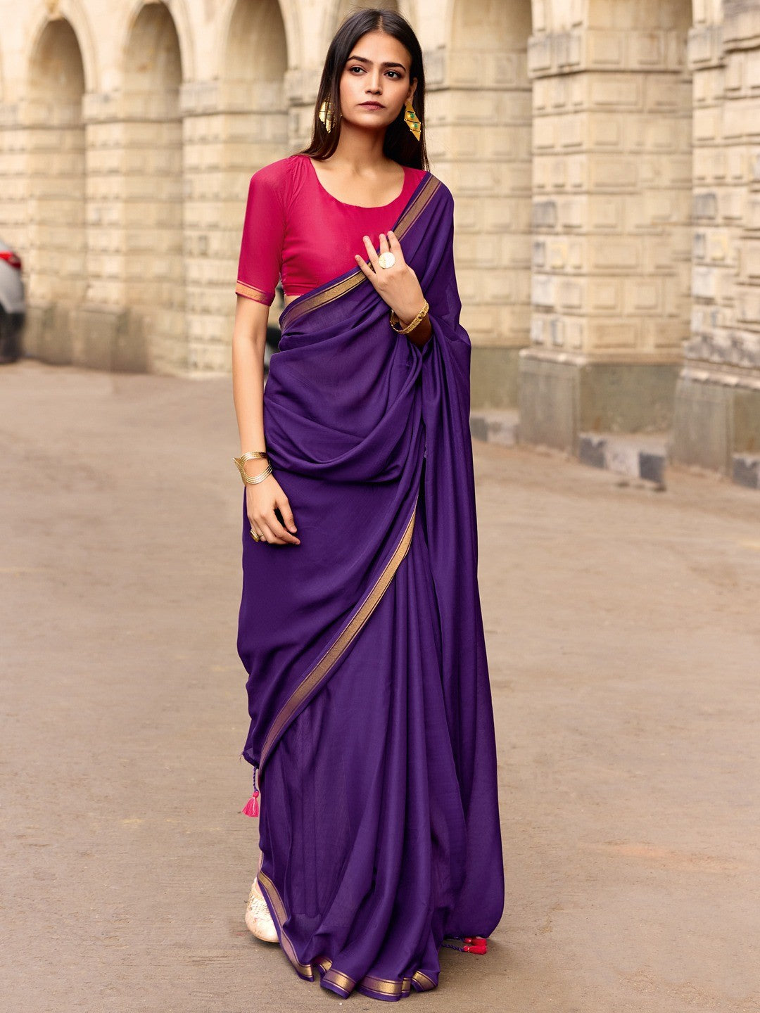 Charming Purple Solid Mulmul Cotton Saree Highlighted By Zari Weaving Border & Tassel Pallu - Image 1