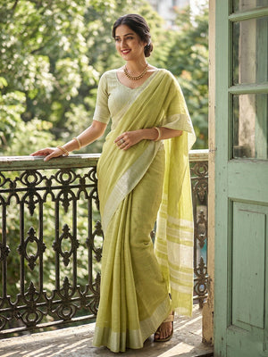 Green Linen Saree with Silver Zari Border Stylish Lightweight Ethnic Outfit - Image 1