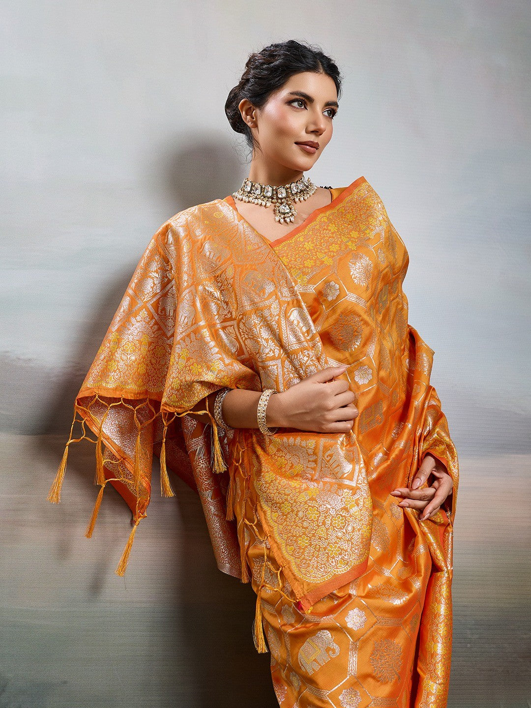 Elegant Orange Floral & Elephant Motif Silk Blend Saree with Zari Work - Image 4