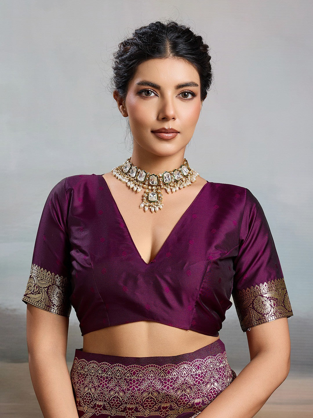 Graceful Wine Floral & Elephant Motif Silk Blend Saree With Zari Weaving & Tassels Pallu - Image 2