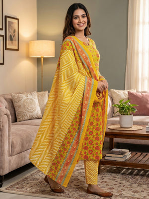 Exclusive Mustard Floral Printed Rayon Dress Material With Delicate Design Finish - Image 1