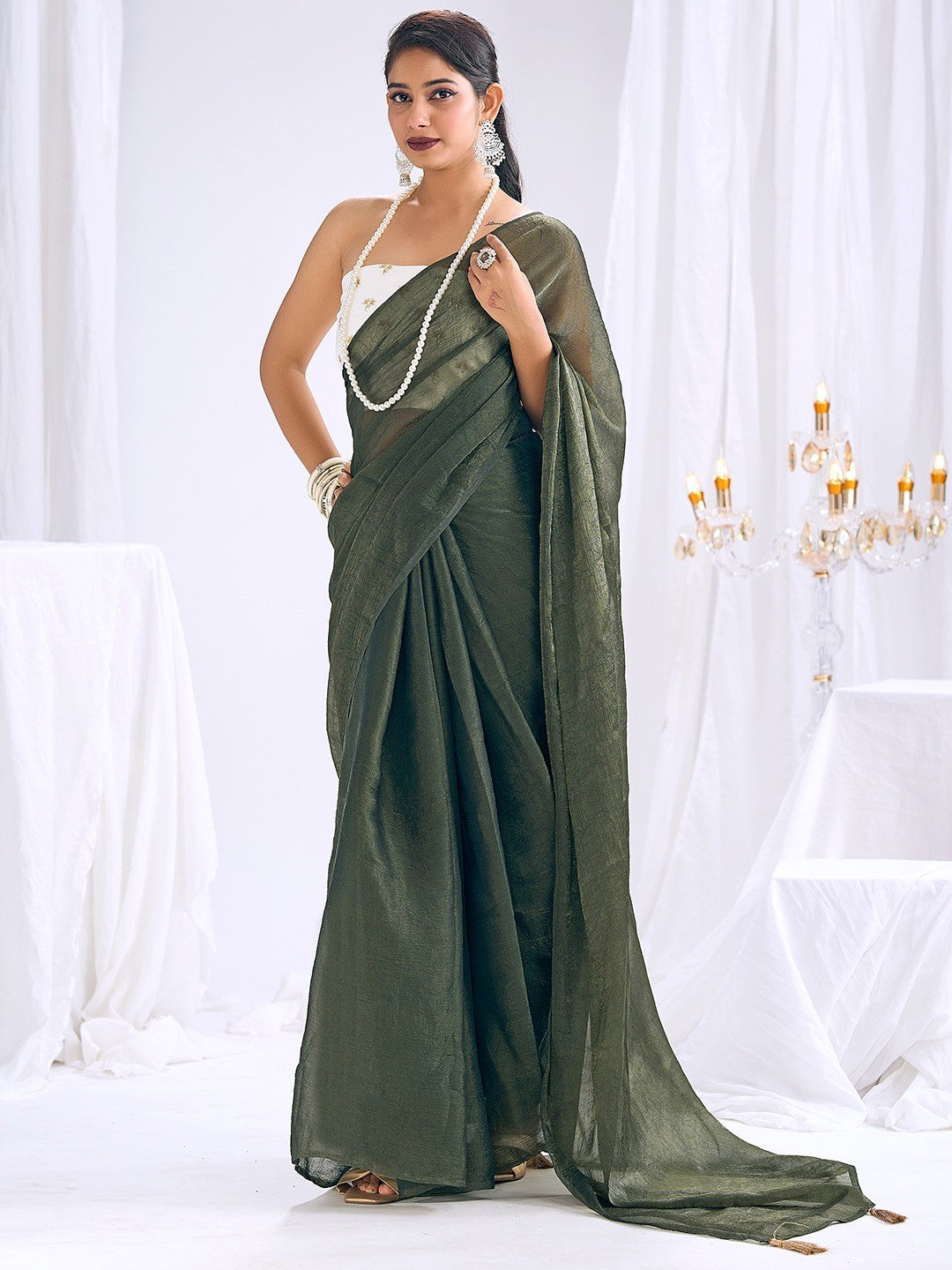 Graceful Green Art Silk Party Wear Saree With Minimal Solid Design & Tassel Pallu - Image 1