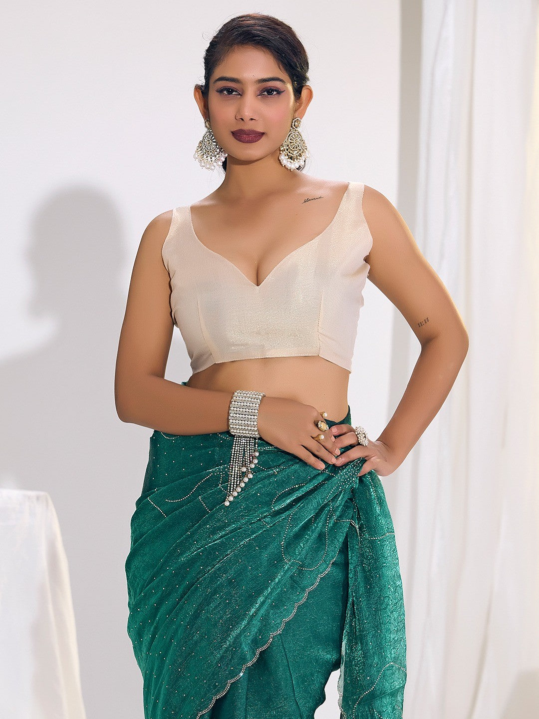 Stunning Teal Satin Silk Saree Highlighting Floral Stone Work Craftsmanship - Image 3