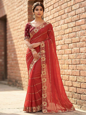 Sophisticated Coral Pink Striped Pattern Georgette Saree With Floral Thread Embroidered Border - Image 1