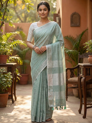 Rama Green Linen Saree with Subtle Zari Detailing Lightweight Occasion Wear - Image 1